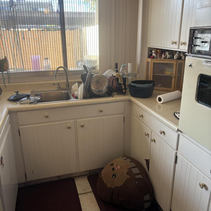 Kitchen sink water pipes with faucet and countertop