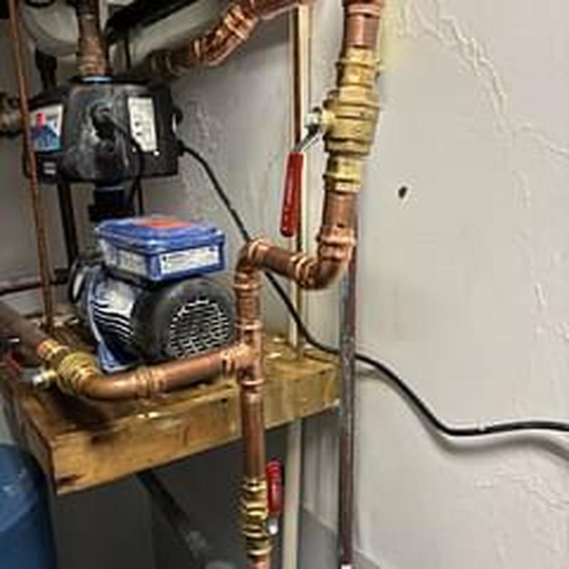 Copper water piping with pump in mechanical room Copper water piping with pump in mechanical room