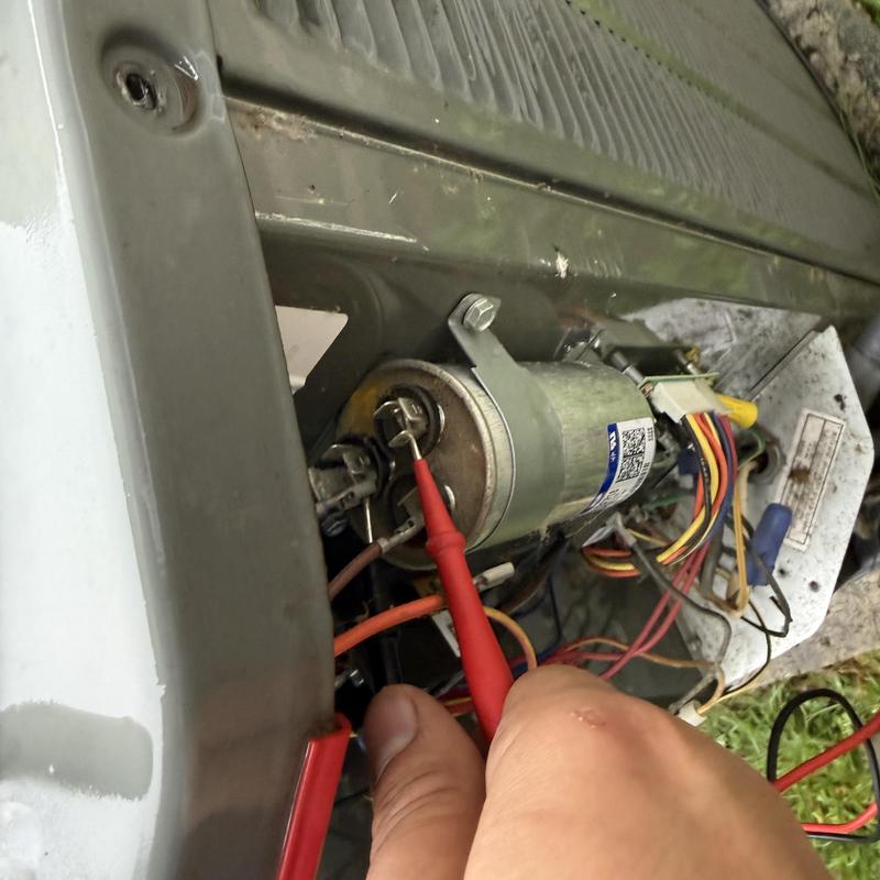 Heat pump capacitor testing with multimeter probe Heat pump capacitor testing with multimeter probe