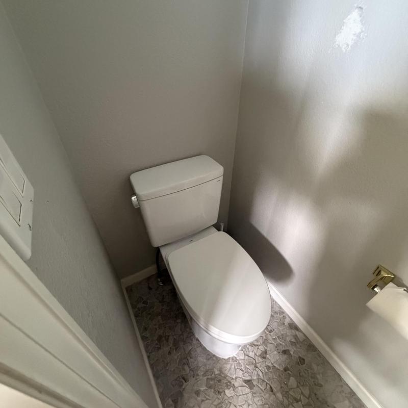 Toilet installation in small bathroom corner Toilet installation in small bathroom corner