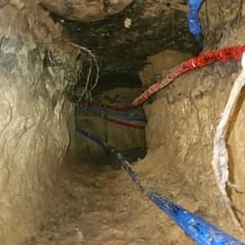 Water heater hot and cold water lines underground trench