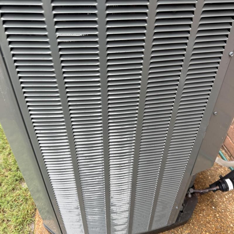 HVAC outdoor condenser unit with clean grille and wiring HVAC outdoor condenser unit with clean grille and wiring
