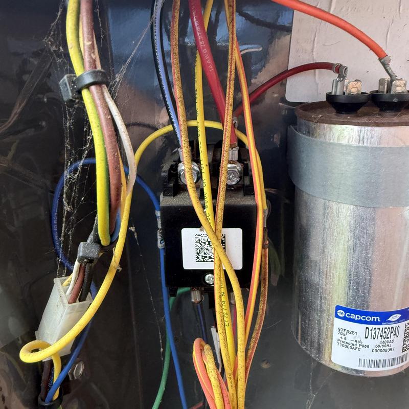 HVAC capacitor and wiring inside unit panel HVAC capacitor and wiring inside unit panel
