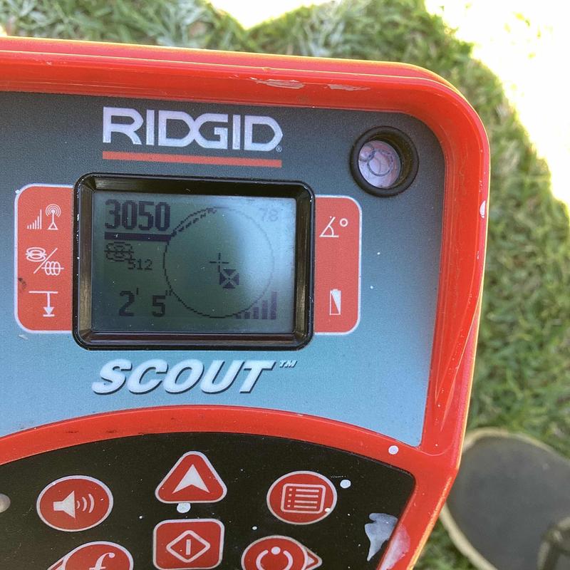 Drain line inspection camera display showing readings