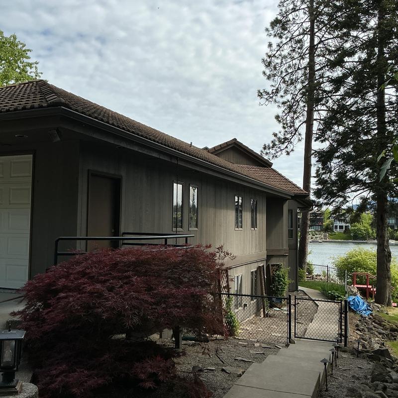 Cement tile roof removal and replacement site