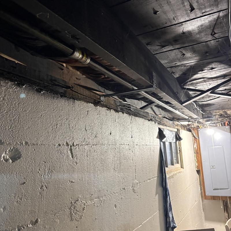 Gas piping system installed in basement ceiling joists