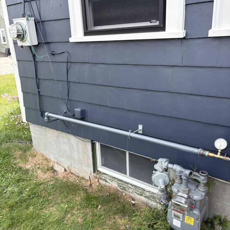 Gas meter and piping replacement on house exterior