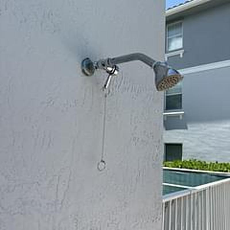 Pool shower valve with pull chain on wall
