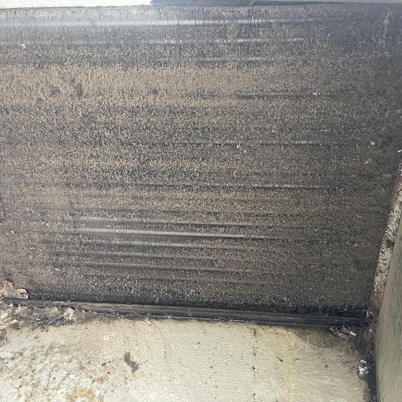 Evaporator coil clogged with dirt and debris