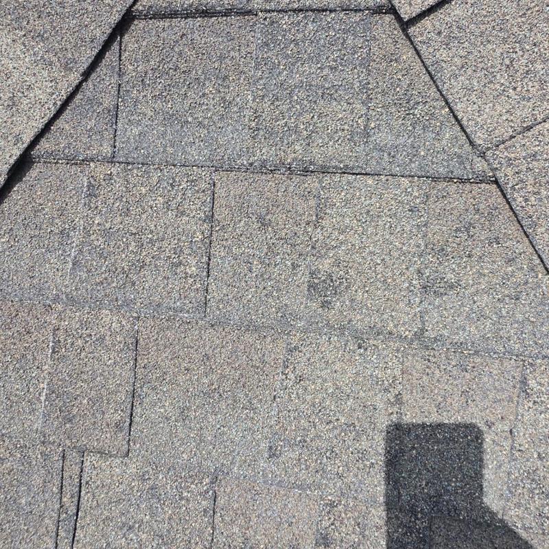Asphalt shingle roof with granule loss and wear