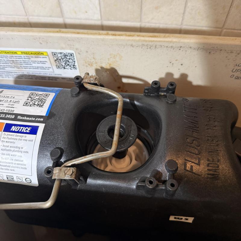 Power-flush toilet cartridge replacement inside tank