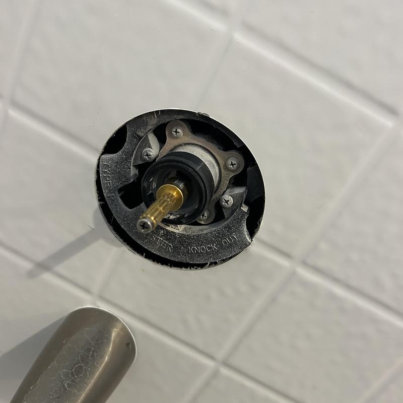 Shower valve stem and trim waterproofing in wall cavity