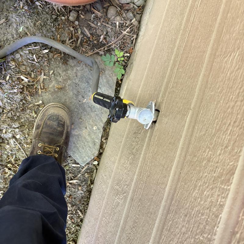 Outdoor hose bib with attached garden hose valve and boot