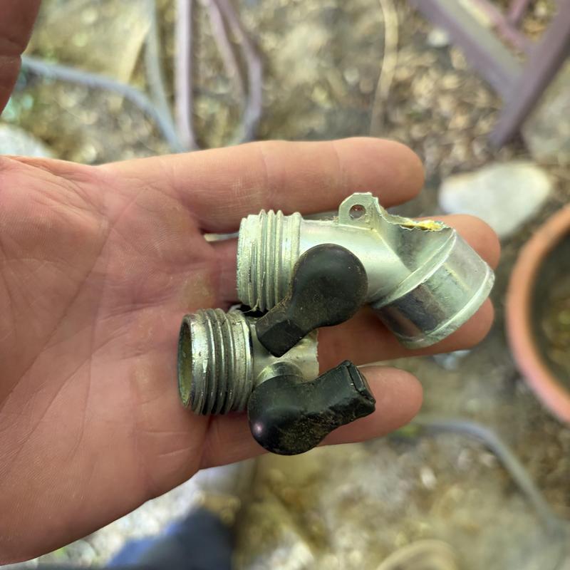 Hose bib extension split valve removed by technician
