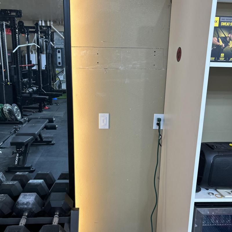 Garage LED strip lighting behind mirror with switch