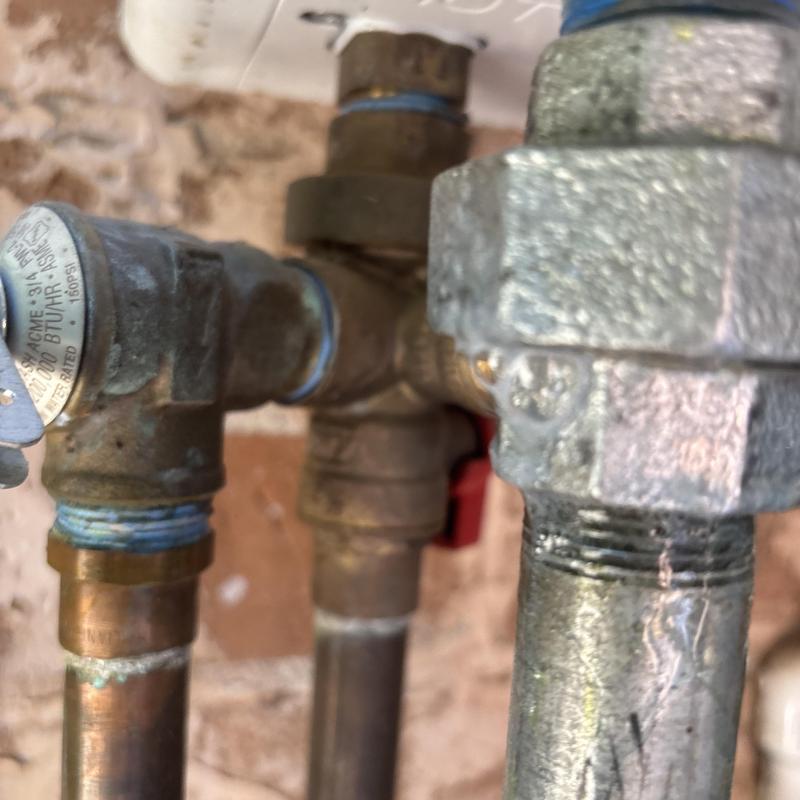 Backflow preventer assembly with pipe fittings in Glendale, AZ
