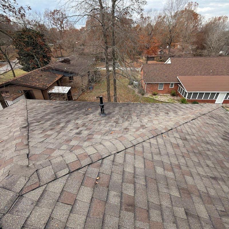 Asphalt shingle roof with vent pipe and flashing inspection