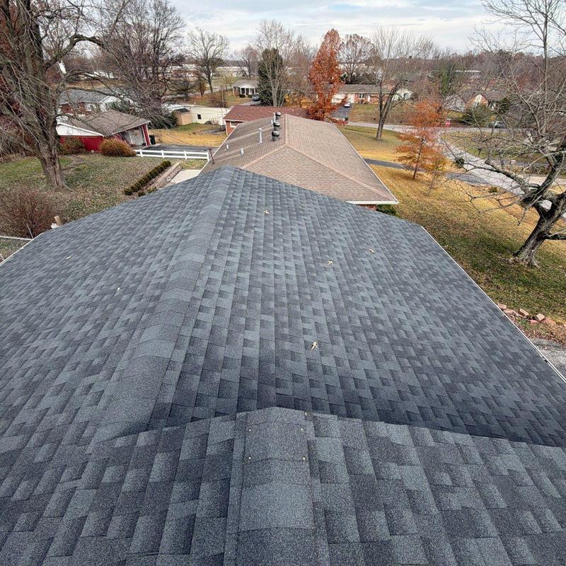 Asphalt shingle roof with ridge vent inspection