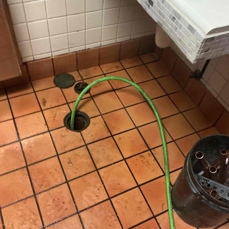 Sewer branch line camera inspection with green hose