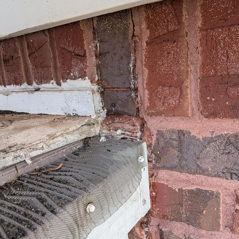 Window sill flashing with sealing and brick wall transition Window sill flashing with sealing and brick wall transition