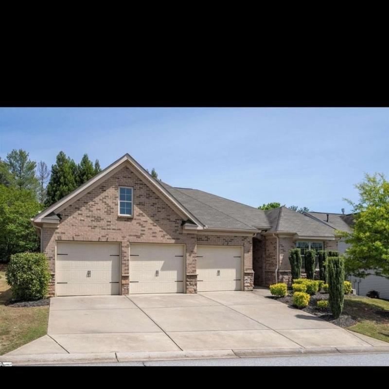 Brick home's roof with pipe boots replaced