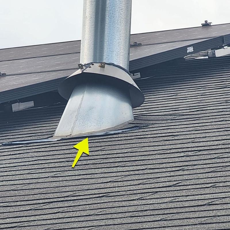 Pipe boot flashing on shingle roof with storm damage