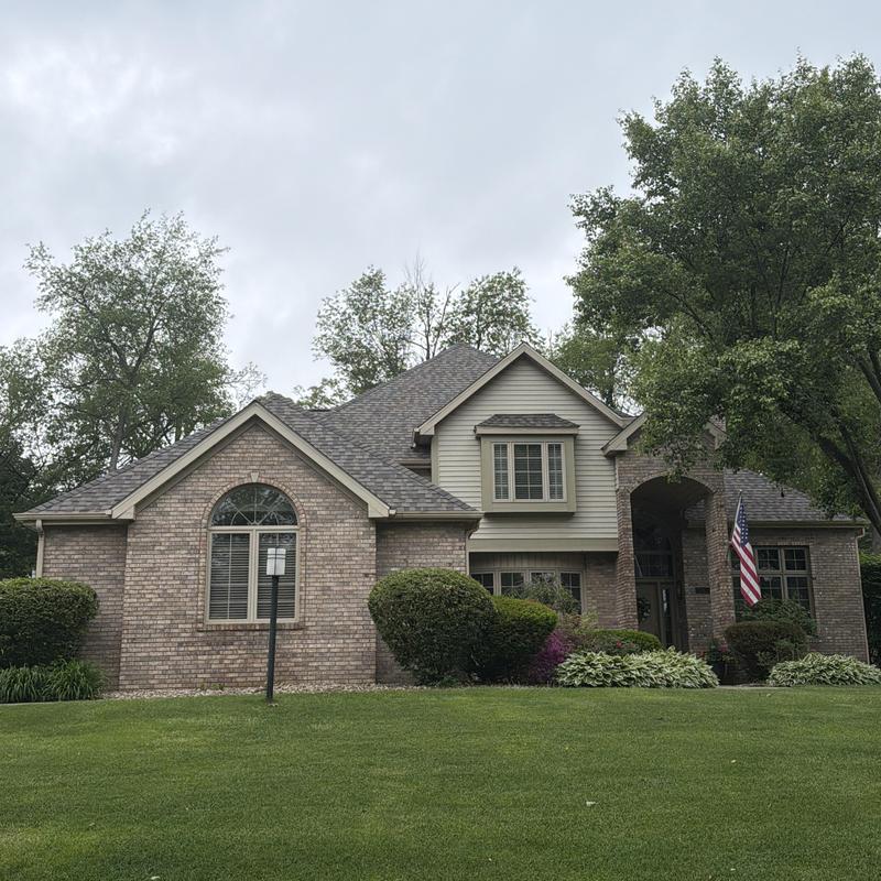 50-year asphalt shingle roof on residential brick home