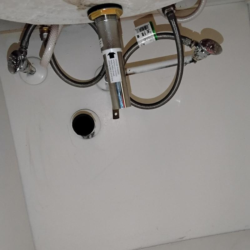 Pop-up drain assembly under sink with plumbing connections