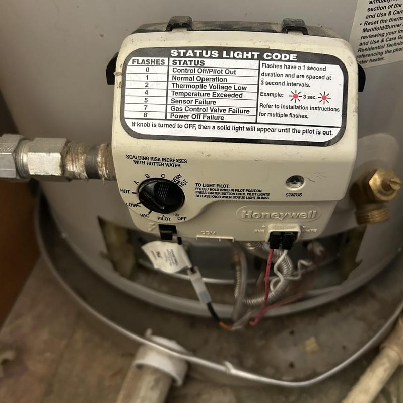 Water heater control panel with status light codes