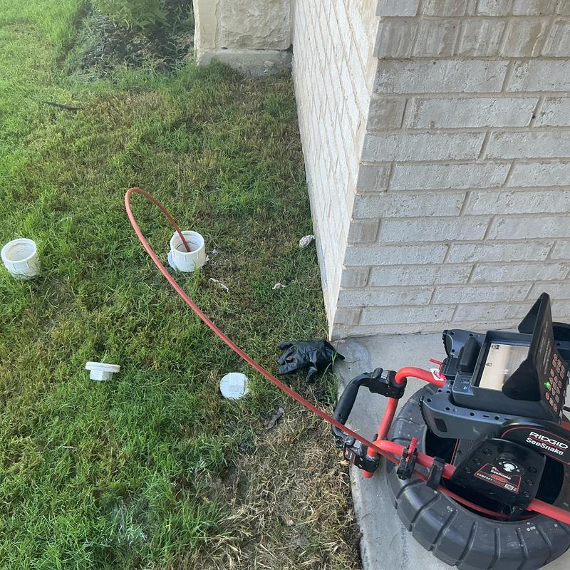 Mainline yard line pipe inspection and cable clearing equipment