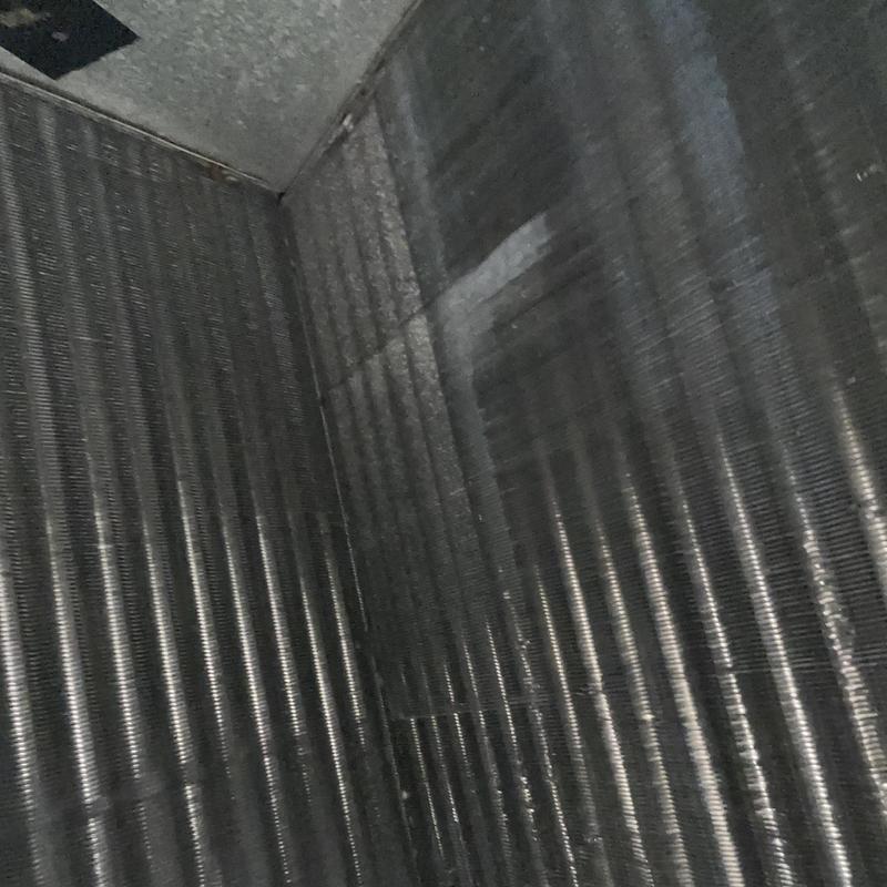 HVAC evaporator coil with dust buildup during maintenance HVAC evaporator coil with dust buildup during maintenance