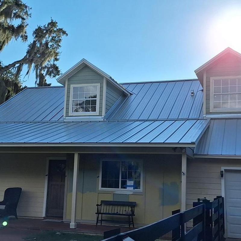 Standing seam metal roof on residential home Standing seam metal roof on residential home