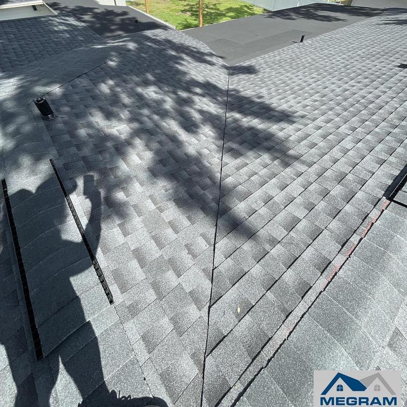 Black architectural shingle roof with tapered insulation system Black architectural shingle roof with tapered insulation system