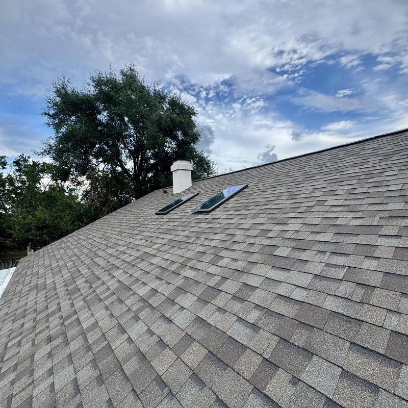Owens Corning Duration shingles with skylights on roof Owens Corning Duration shingles with skylights on roof