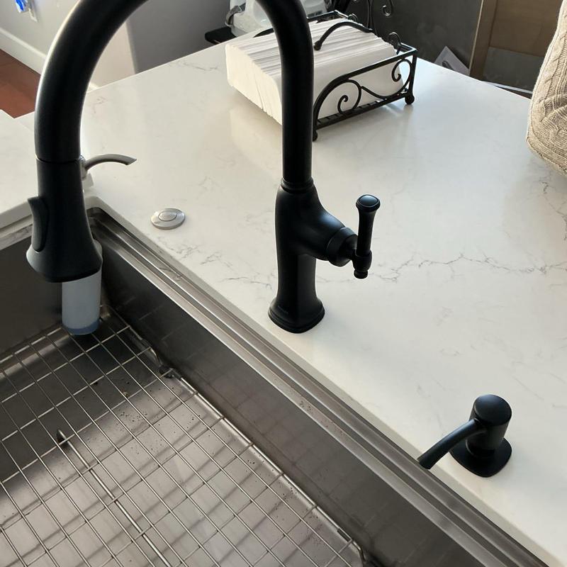 Matte-black Kohler pull-out sprayer faucet and soap dispenser