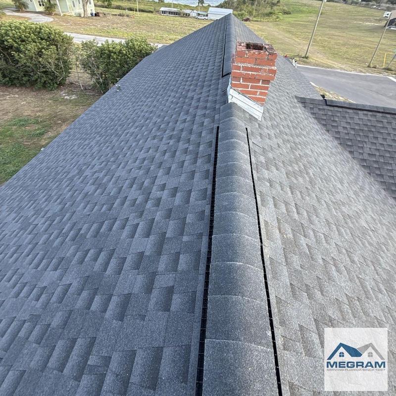 Architectural shingle roof with ridge vent and chimney Architectural shingle roof with ridge vent and chimney