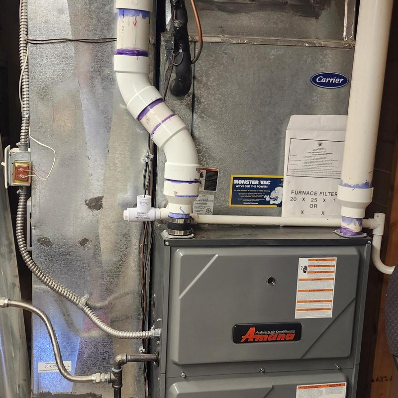 Amana furnace with PVC vent pipes and ductwork