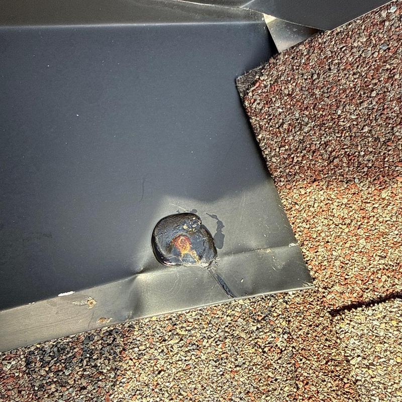 Flashing system with hail impact near shingle edges