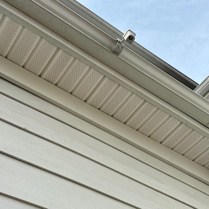 Gutter and soffit with mounted security camera