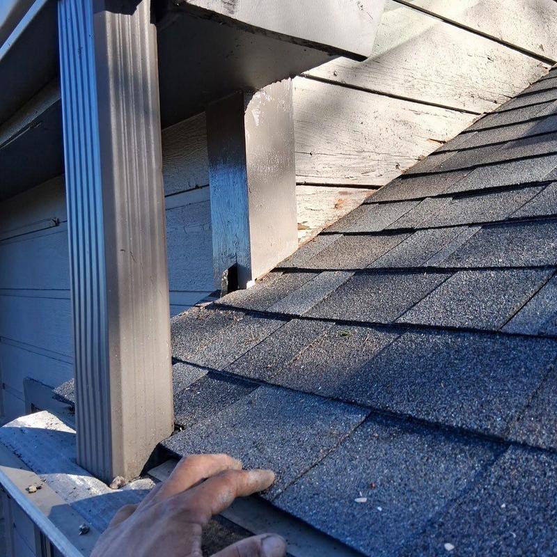Roof shingles with hail damage inspection in Brentwood
