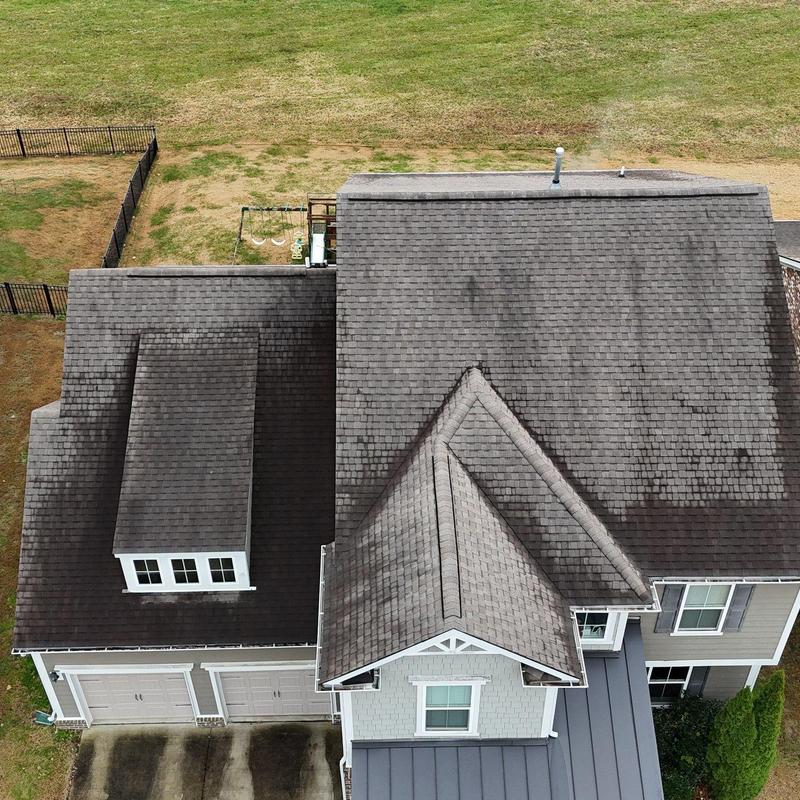 Asphalt shingle roof with potential hail damage inspection