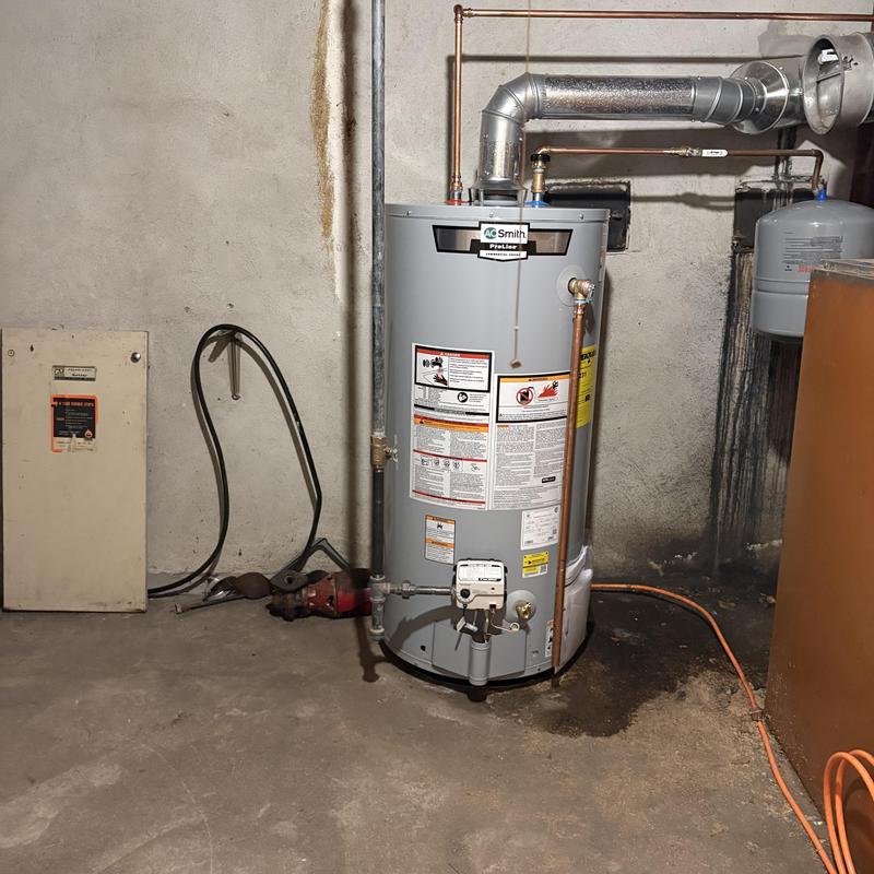 Gas water heater with new pressure reducing valve installed