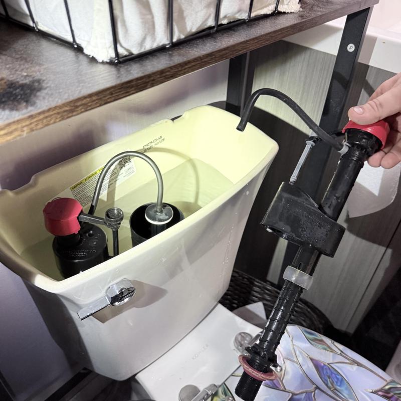 Toilet fill valve and flapper replacement in tank