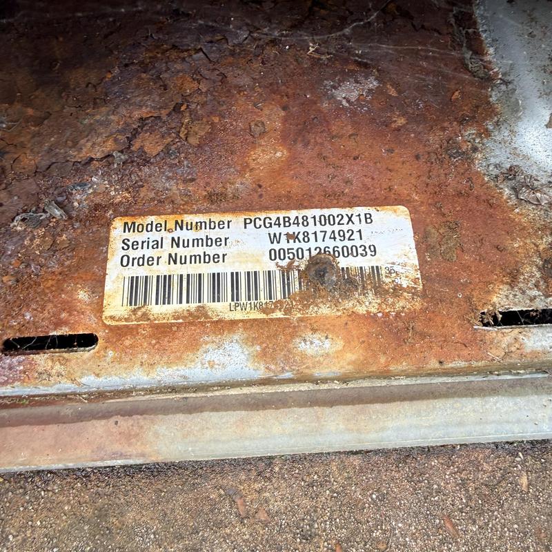 Condensing coil rust and model label on HVAC unit Condensing coil rust and model label on HVAC unit