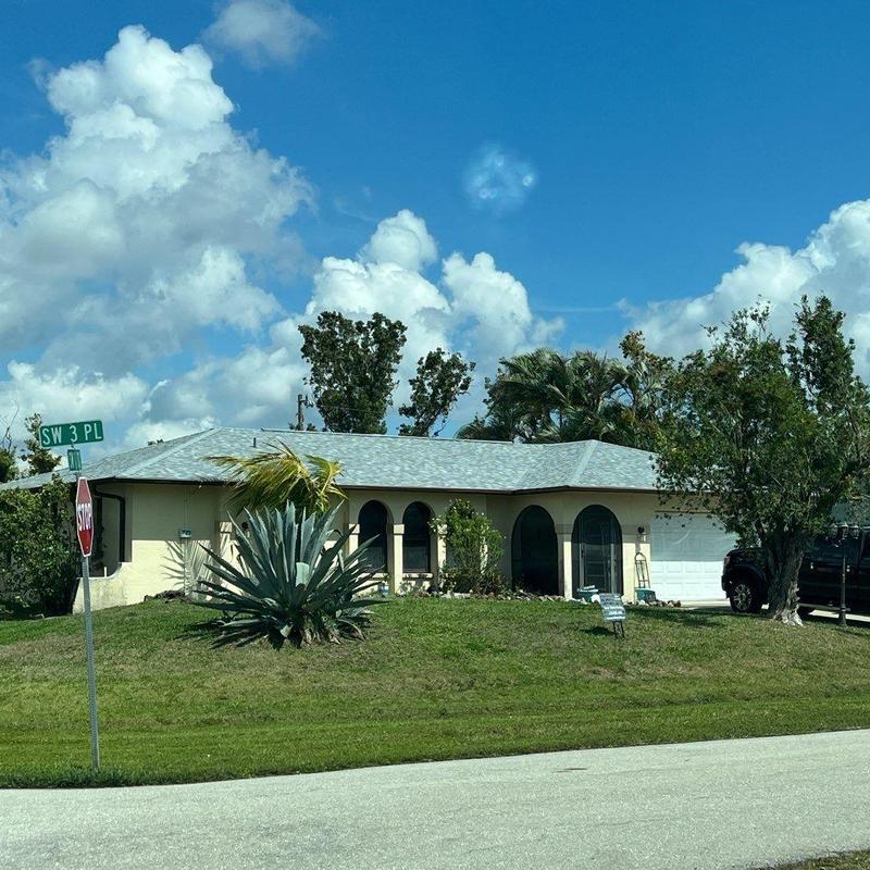 Shingle roof replacement on residential home in Florida Shingle roof replacement on residential home in Florida