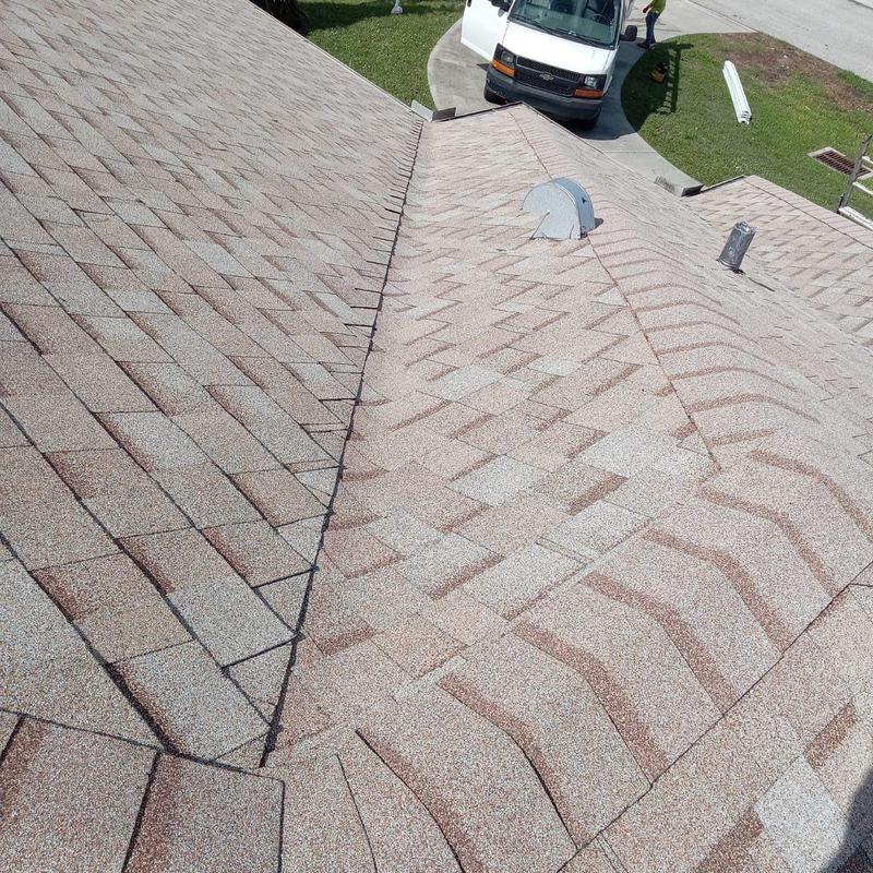 Shingle roof with vent installation on residential home Shingle roof with vent installation on residential home