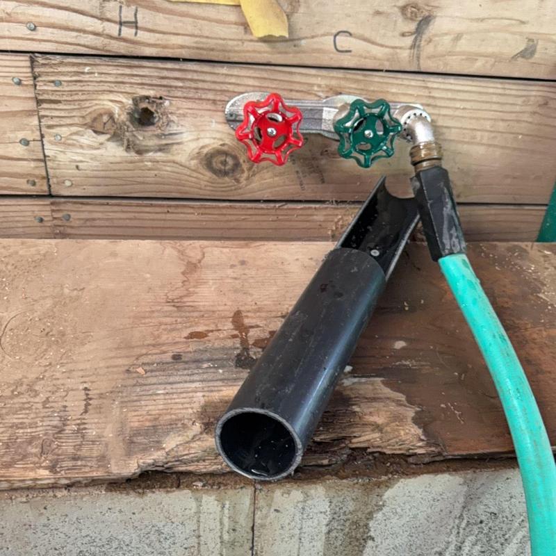 Frost-free hot and cold hose bib with hose attached