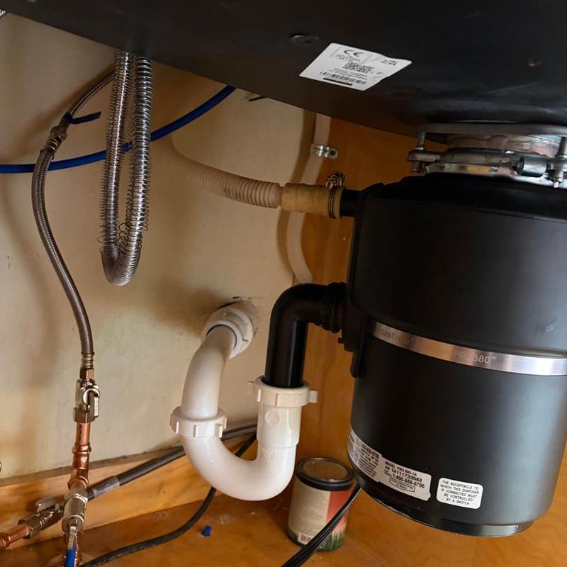 Kitchen sink garbage disposal and plumbing connections