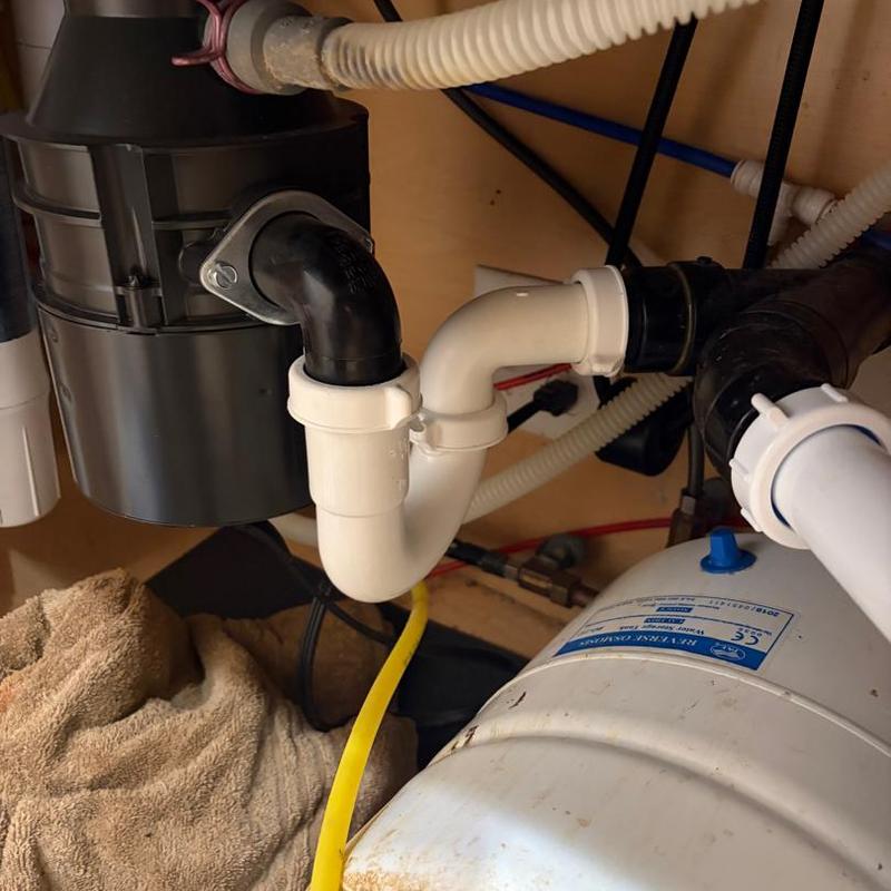P Trap and drain pipes under kitchen sink