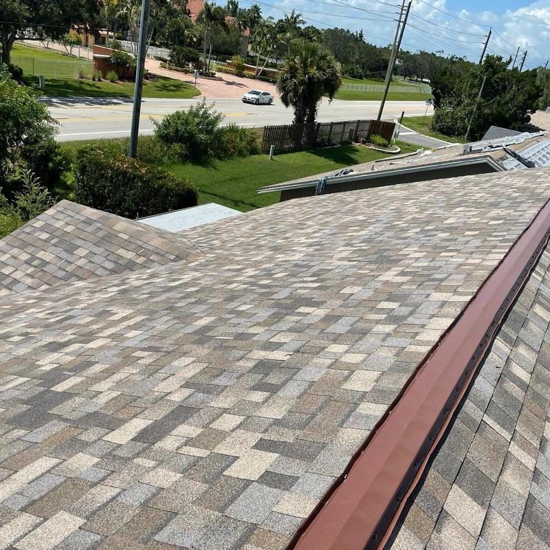 Shingle roof with new ridge cap in Fort Myers, FL Shingle roof with new ridge cap in Fort Myers, FL